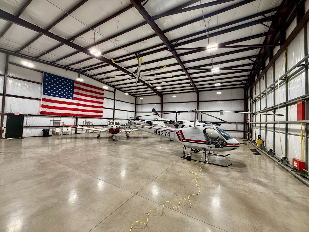 Technician working on Enstrom helicopter
